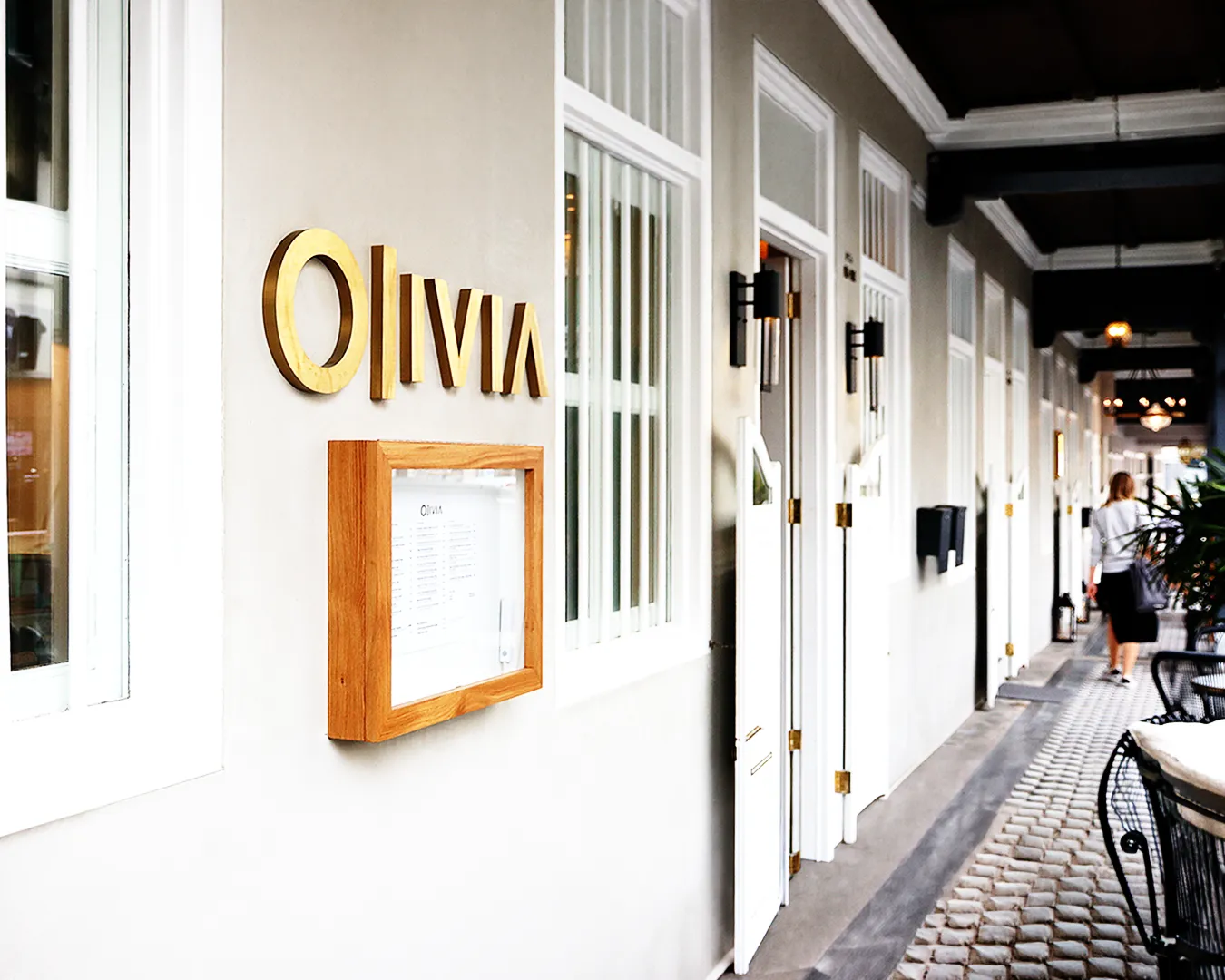 Minimalist restaurant signage in Singapore with clean typography, demonstrating clear and legible logo design for strong brand visibility
