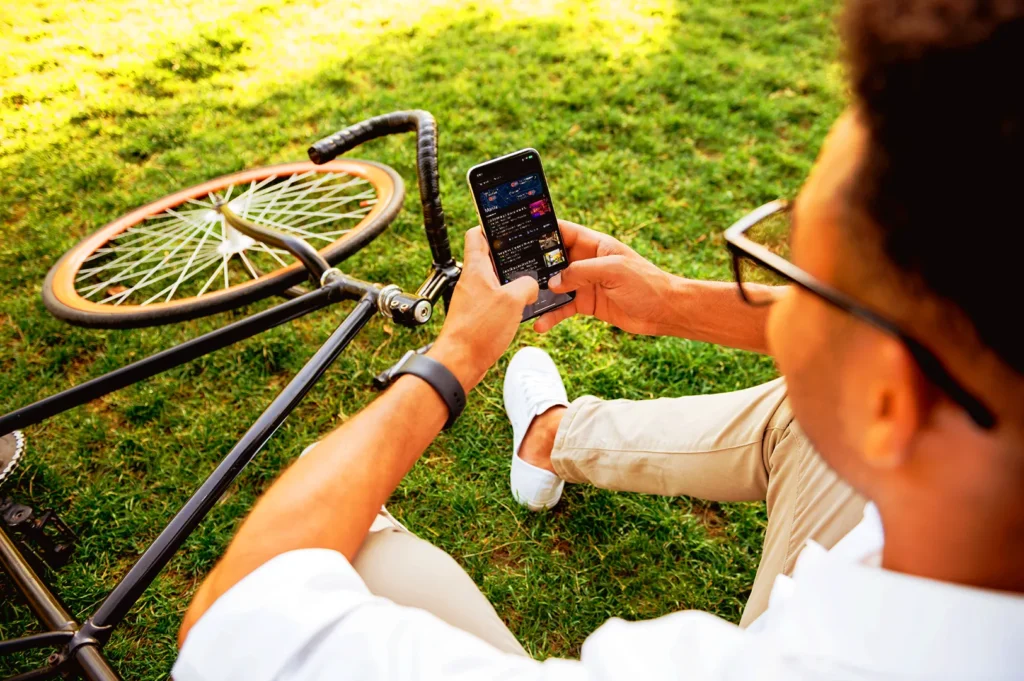 Customer using smartphone to search for nearby restaurants in Singapore, demonstrating Google Maps visibility and mobile dining decisions