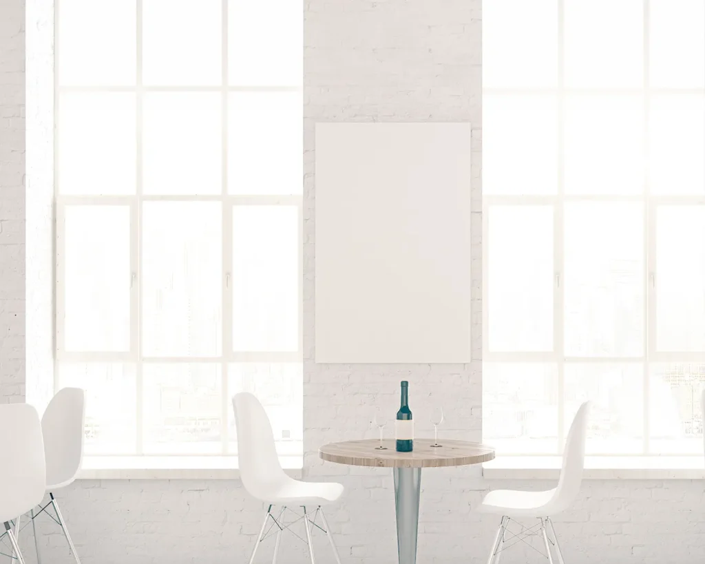 Minimalist restaurant branding and interior design concept in Singapore with clean dining space and blank branding wall