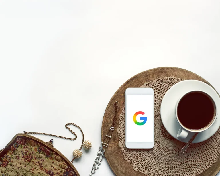Google Business Profile search on smartphone beside coffee cup, restaurant local SEO audit, Google Maps visibility, restaurant search rankings Singapore