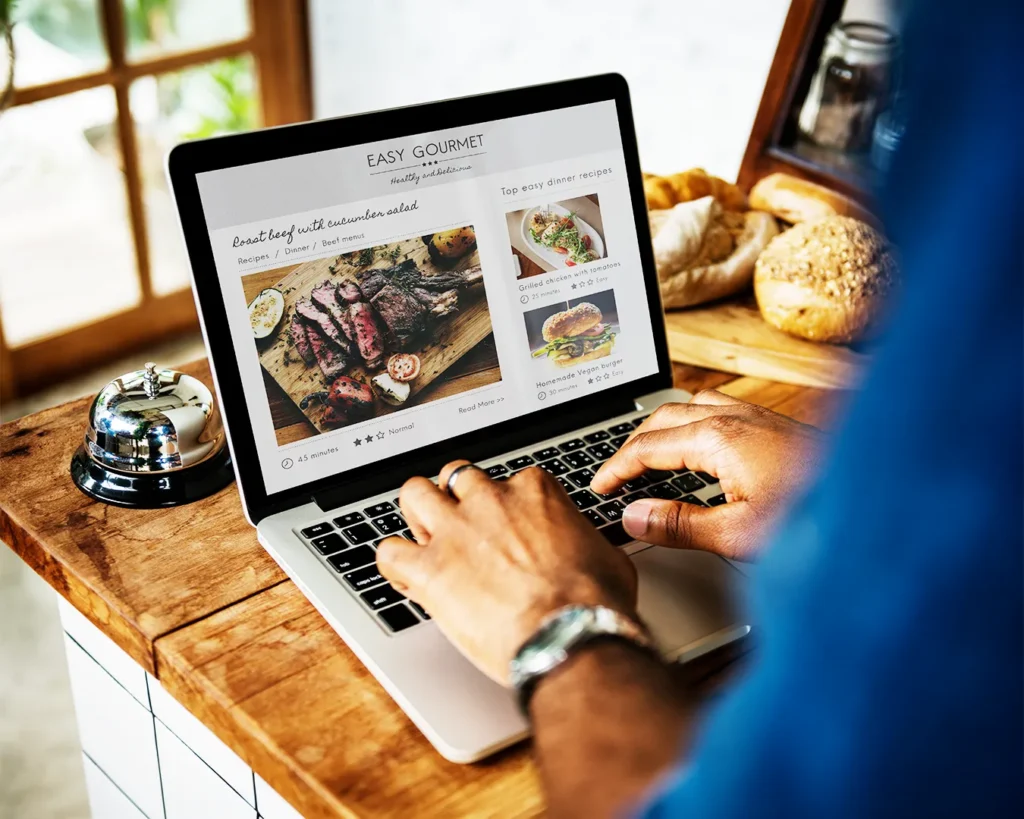 Restaurant website menu displayed on laptop, restaurant SEO optimization, online menu visibility, digital marketing for restaurants Singapore