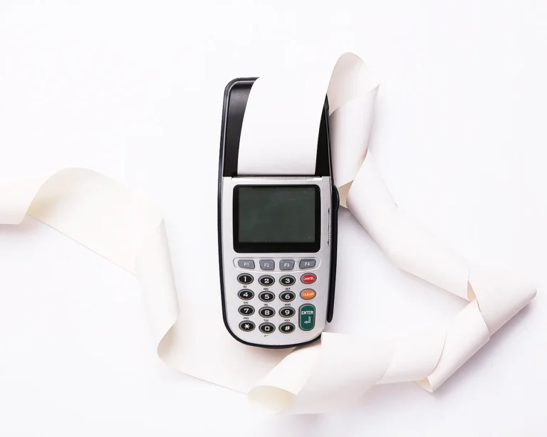 Traditional POS receipt printer with paper rolls for restaurant sales and transaction processing
