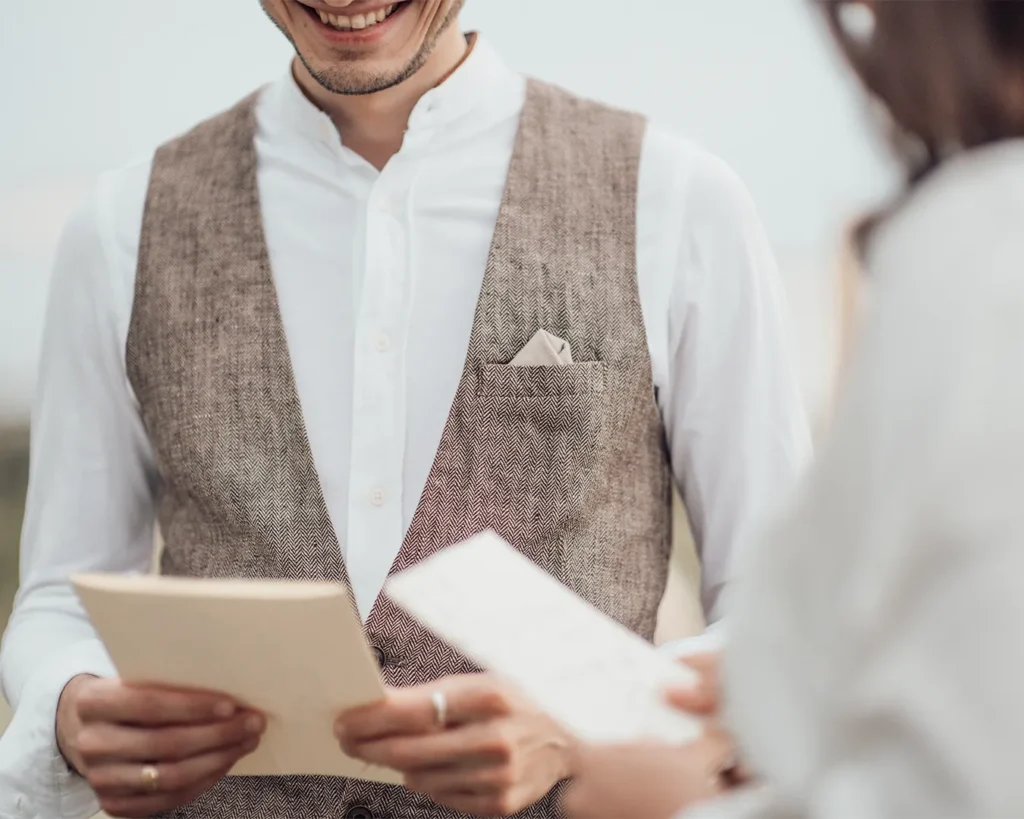 Restaurant waiter discussing menu options with a customer