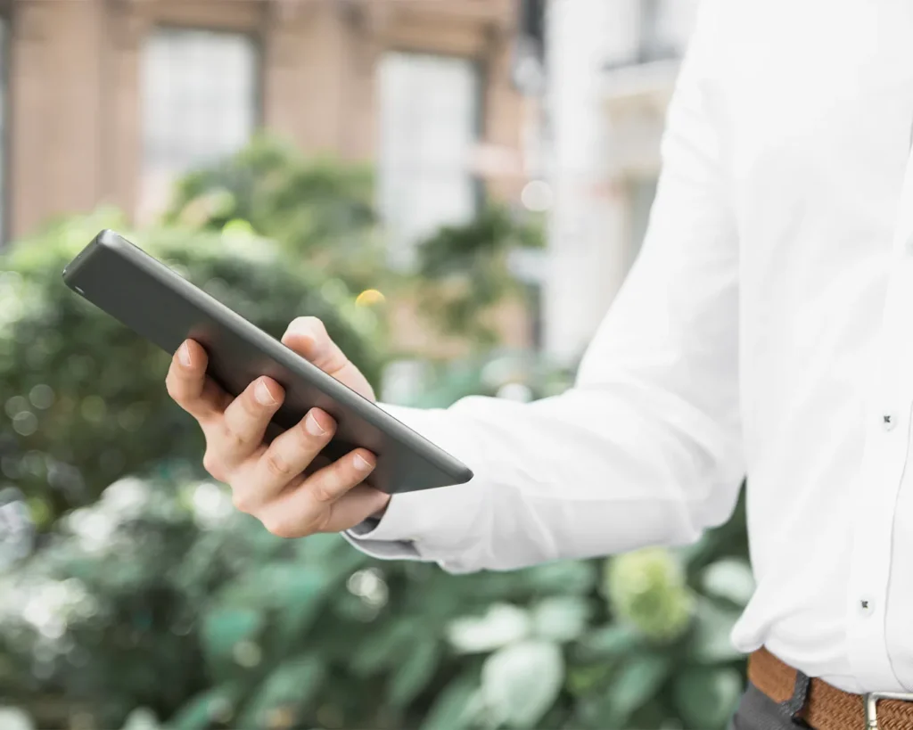 Restaurant influencer reviewing social media strategy on tablet