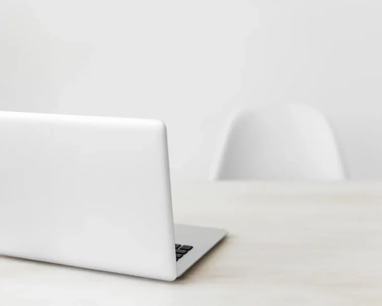 Laptop on office desk representing digital marketing strategy and business technology
