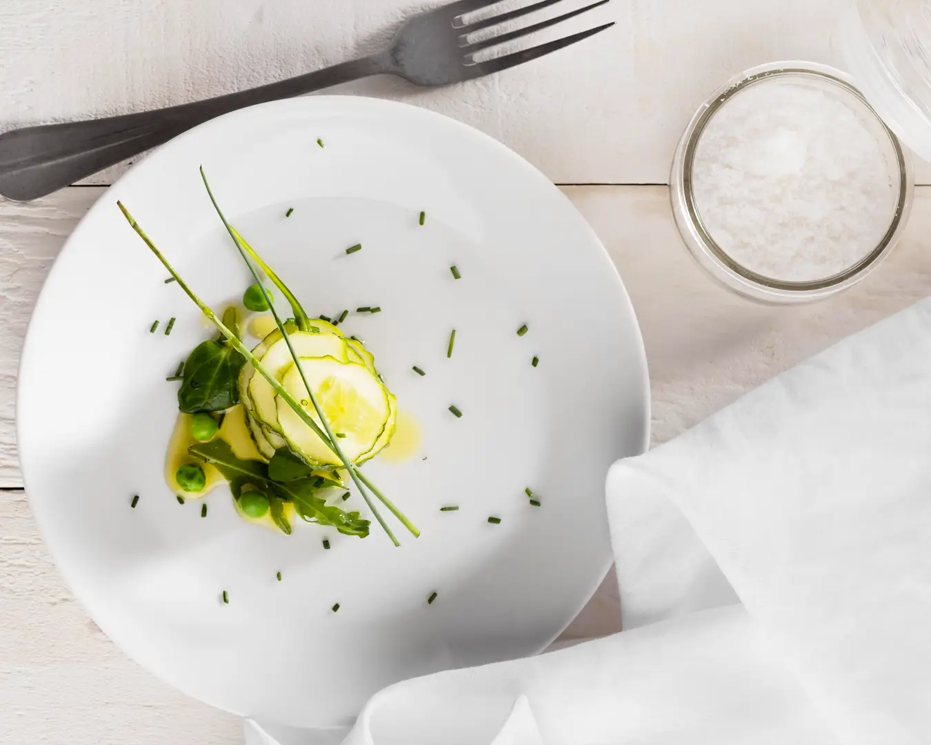 Elegant plated dish with minimalist presentation for restaurant brand identity and food branding