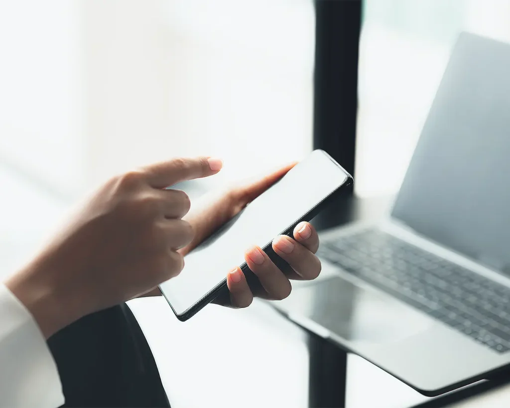 Restaurant customer using mobile phone for digital engagement and personalized dining promotions