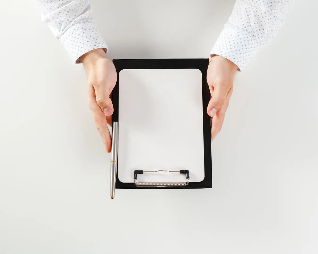 Blank restaurant clipboard and pen representing F&B branding strategy, planning, and professional design direction
